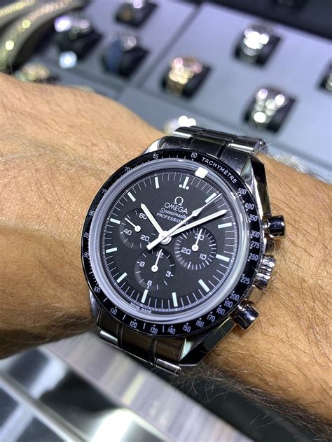 omega speedmaster moonwatch lowest price.